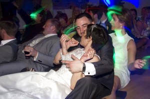 bride-and-groom-dancing-to-80's-music-at-wedding-at-friern-manor--in-brentwood-essex,-photographer